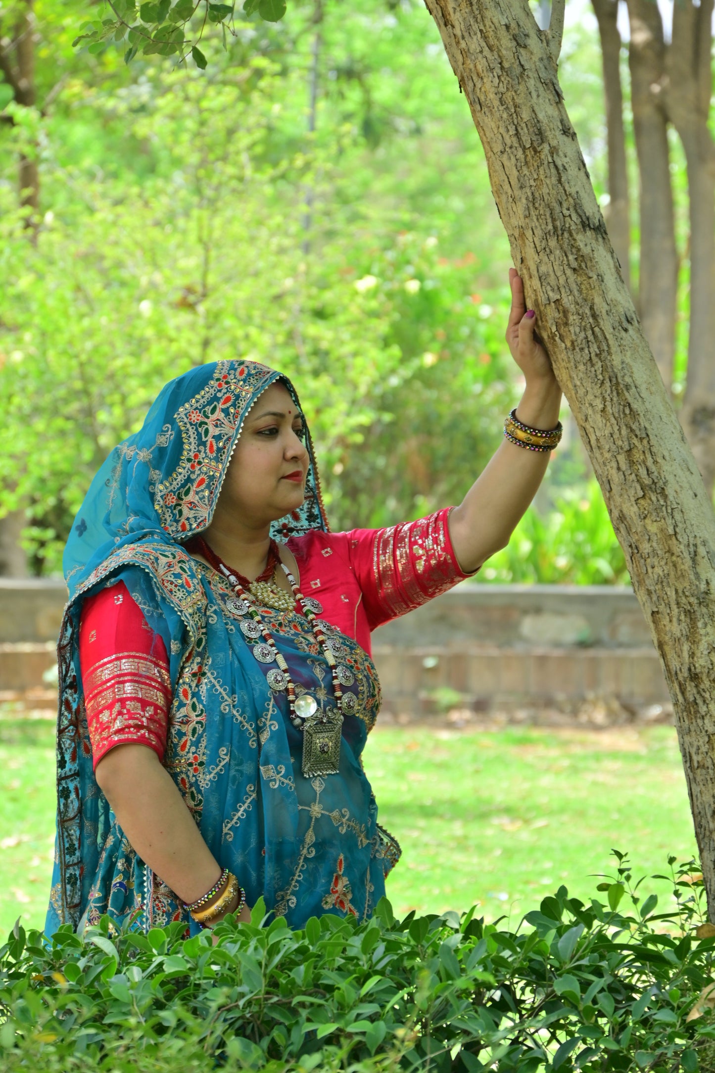 Teal Blue Rajasthani Lehenga with Red Choli & Odhani