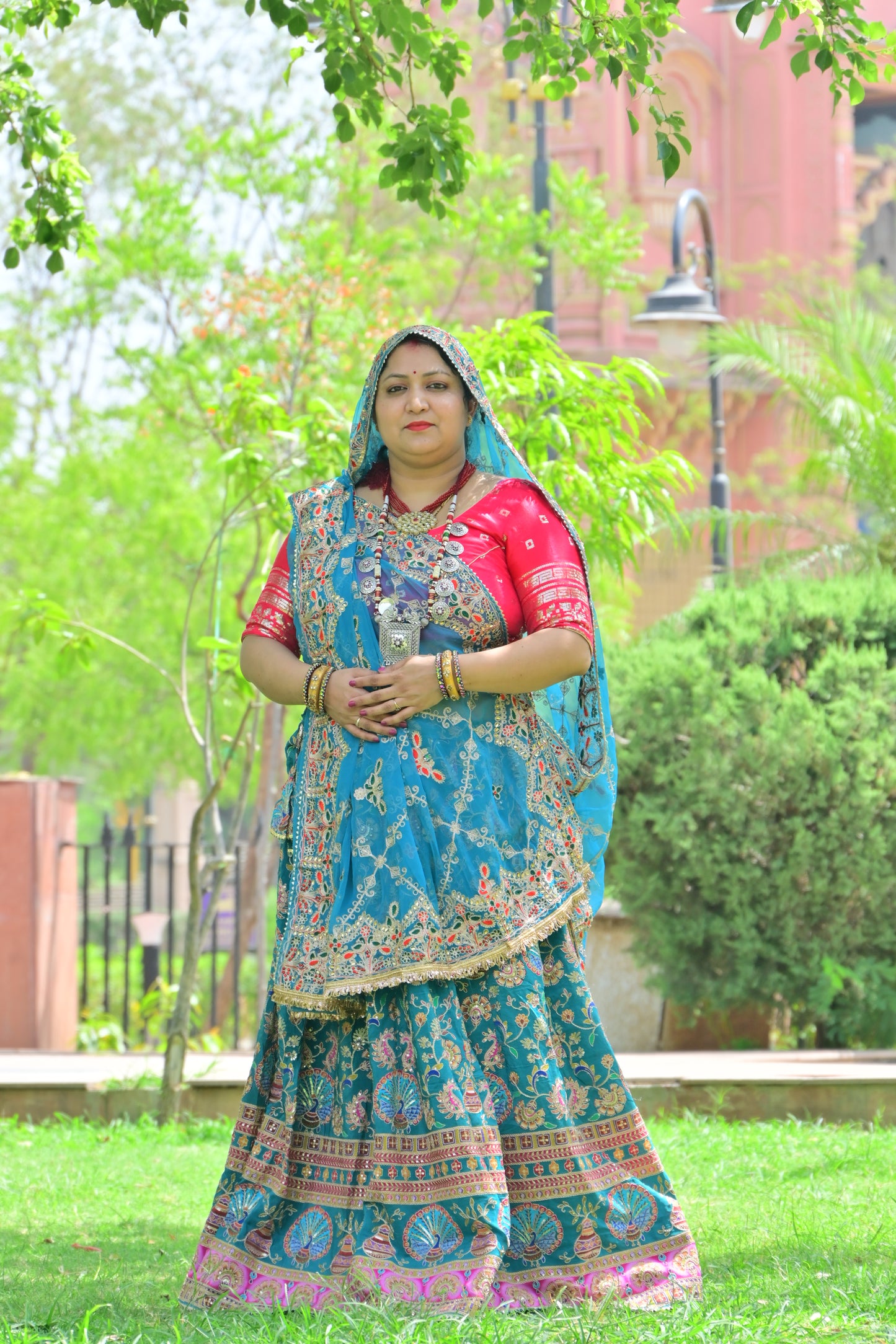 Teal Blue Rajasthani Lehenga with Red Choli & Odhani