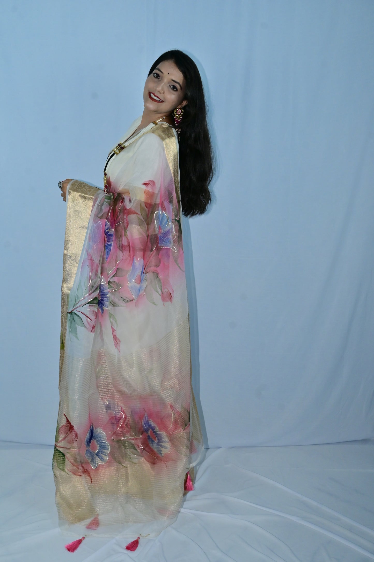 White Floral Saree with Golden Zari Border – Jaipur Style