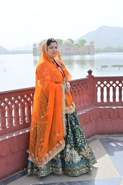 Green Lehenga with Orange Odhani & Heritage Embroidery