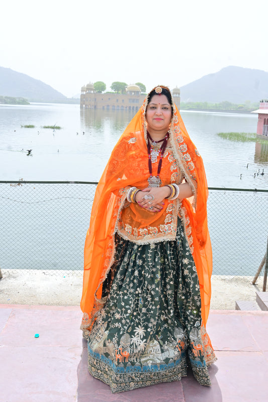Green Lehenga with Orange Odhani & Heritage Embroidery
